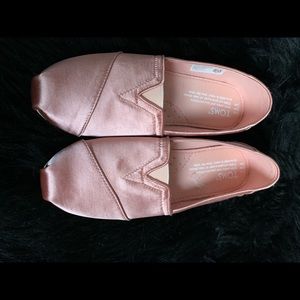 Toms rose gold slip on’s